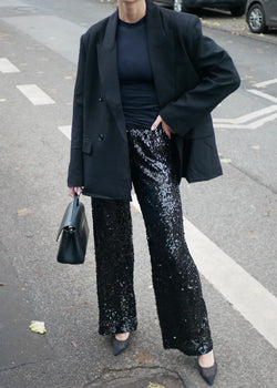 ‘GLAM FLARED PANTS' sequins black